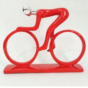 MAN ON BICYCLE SCULPTURE IN RED